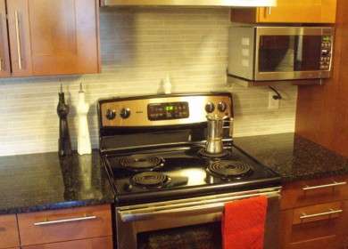 A Kenmore (Electrolux) electric stove in a condo kitchen