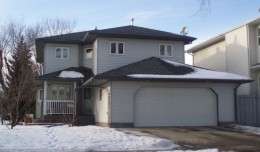Two-storey infill home with attached garage in Westmount, Edmonton